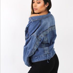 Denim Jacket with lace details on sleeves.